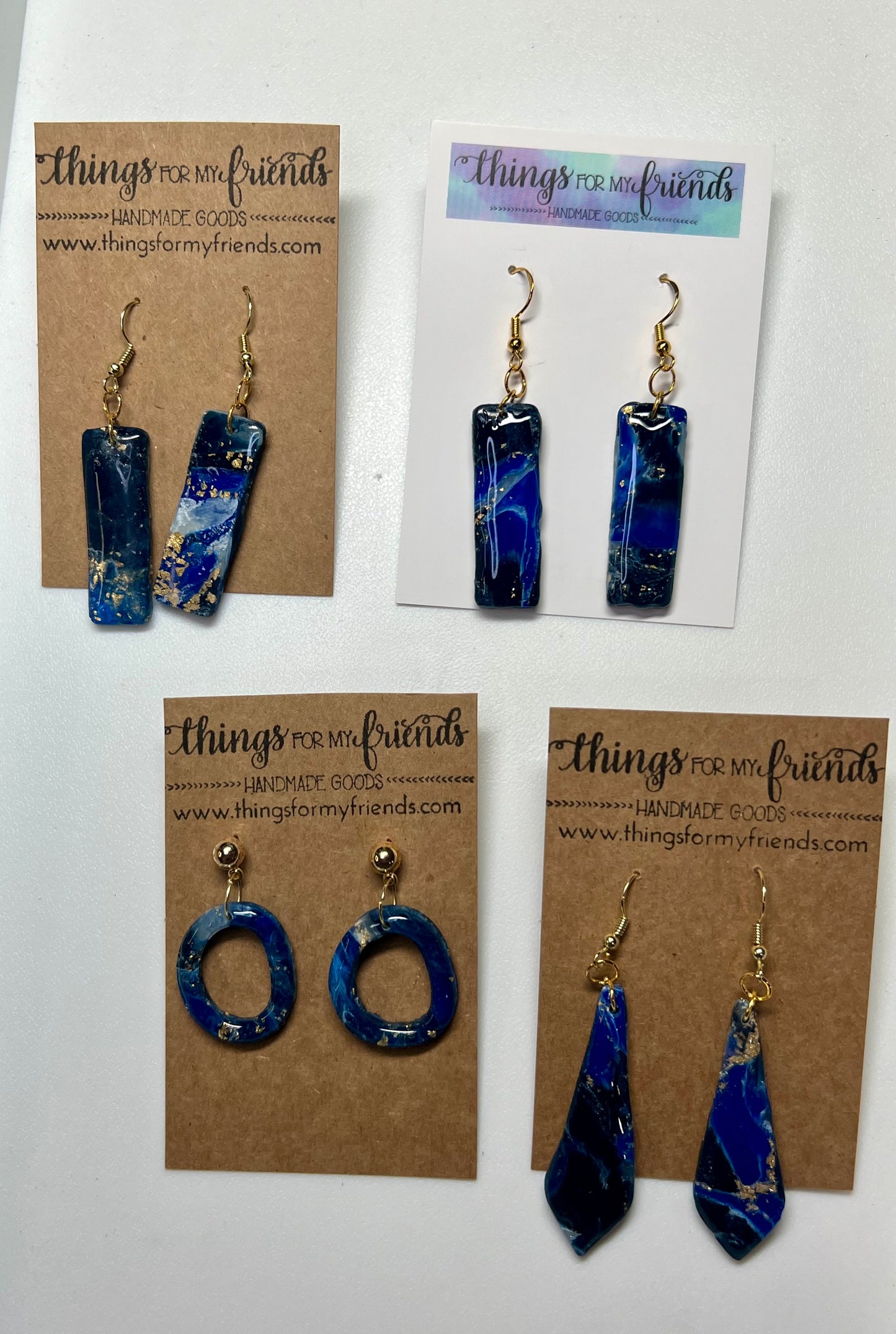 Dangles- Blue/Gold Marble